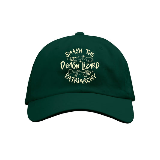 This Buffering the Vampire Slayer Limited Edition dark green Dad Hat features Smash the Demon Lizard Patriarchy in cream text, with charming illustrations of two lizards.