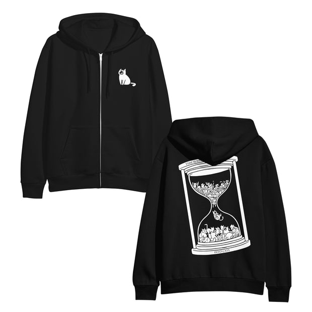 image of the front and back of a black zip up hoodie. front is on the left and has a small chest print  in white on the right of a cat. back is on the right and has a full back print in white of an hourglass with cats inside.