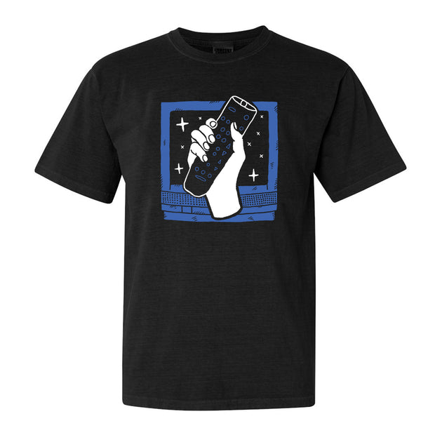 image of a black tee shirt on a white background. tee has center chest print of a blue television with a white hand holding a remote control in front of it.