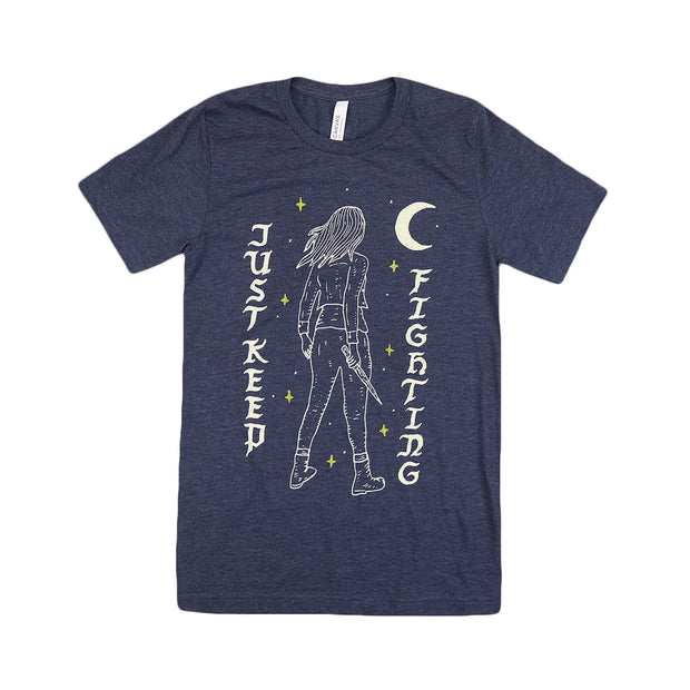 image of a navy tri blend tee shirt on a white background. tee has full chest print that says vertically on the left just keep with the back of a woman holding a stake in the middle and a cresent moon and fighting on the right
