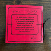image of a the back red booklet on a wooden background. booklet says buffy and faith, and is erotic stories from season three. this is showing the signatures on the back of the Kristen and Jenny from the podcast